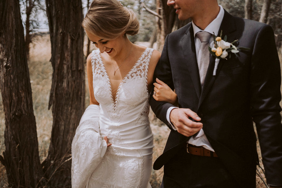 Wedding Bride and Groom at The Boatshed Wellington | Custom Wedding Signage | The Paper Gazelle